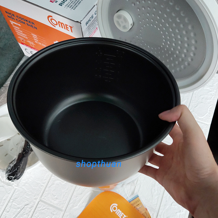 1 noi com dien comet nap cai CM8018 1.8l